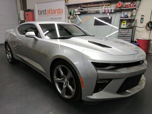 Silver Chevrolet Camaro SS with dark window tint installation Salt Lake City