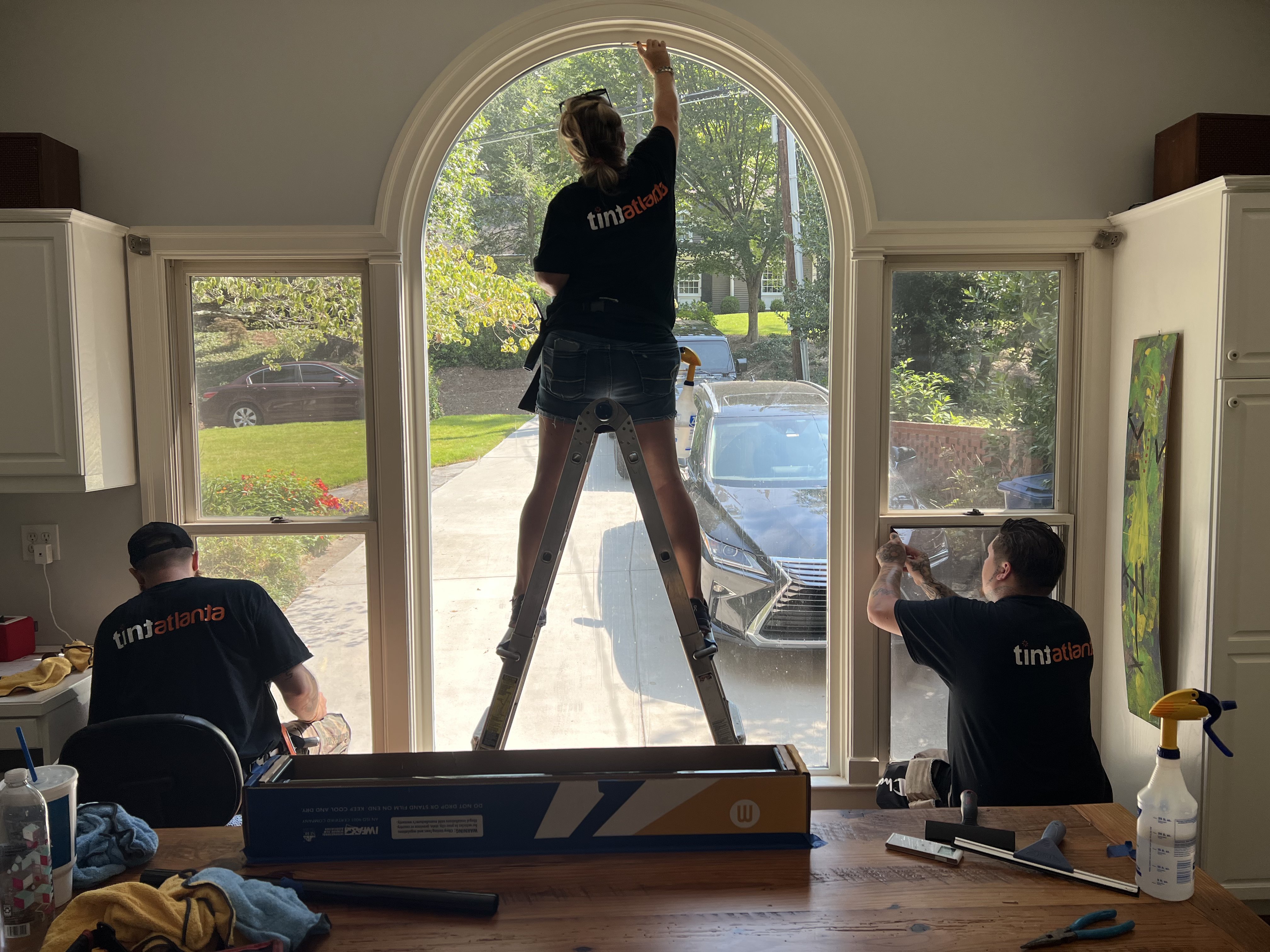tintsaltlake team installing residential window film
